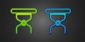 Green and blue Camping portable folding chair icon isolated on black background. Rest and relax equipment. Fishing seat