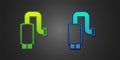 Green and blue Car muffler icon isolated on black background. Exhaust pipe. Vector