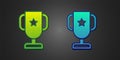 Green and blue Casino poker trophy cup icon isolated on black background. Vector