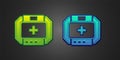 Green and blue First aid kit icon isolated on black background. Medical box with cross. Medical equipment for emergency Royalty Free Stock Photo