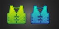 Green and blue Fishing jacket icon isolated on black background. Fishing vest. Vector Royalty Free Stock Photo