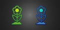 Green and blue Flower icon isolated on black background. Vector Royalty Free Stock Photo