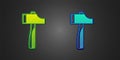 Green and blue Hammer icon isolated on black background. Tool for repair. Vector