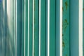 Green and blue metal fence background Royalty Free Stock Photo