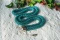 Green-blue necklace from beads Royalty Free Stock Photo