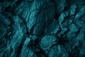 Green blue rock texture. Toned rough mountain surface texture. Crumbled. Close-up. Royalty Free Stock Photo