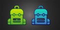 Green and blue School backpack icon isolated on black background. Vector Royalty Free Stock Photo