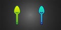 Green and blue Spoon icon isolated on black background. Cooking utensil. Cutlery sign. Vector