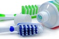 Green, blue toothbrushes and toothpaste isolated on a white back Royalty Free Stock Photo