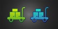 Green and blue Trolley suitcase icon isolated on black background. Traveling baggage sign. Travel luggage icon. Vector