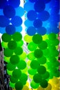 Green, blue and yellow balloons make a nice background