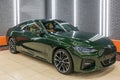 BMW 4 Series Coupe. Green BMW 420i coupe car in the tuning and detailing studio. Royalty Free Stock Photo