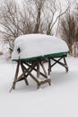 Green boat covered with snow Royalty Free Stock Photo