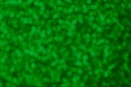 Green bokeh defocused light for overlay effect. Blurred defocused lights. Festive pattern background