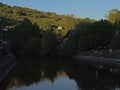 Green borders of river Ourthe near La-Roche-en-Ardenne in the evening Royalty Free Stock Photo