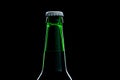 Green bottle beer close-up over black Royalty Free Stock Photo