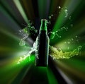 A green bottle of beer with condensed water drops on its surface and a splash of liquid lit by radial colorful light rays Royalty Free Stock Photo