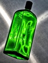 Green bottle of Jagermeister on grey background