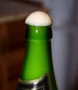 bottleneck of bottle with beer foam