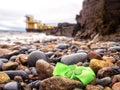 Green bow with shamrock on a rock by Blackrock diving tower, Salthill area, Galway city, Ireland. Popular city landmark and