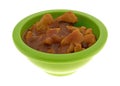 Green bowl with chicken chunks in barbecue sauce Royalty Free Stock Photo