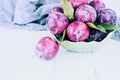 Green Bowl of Fresh Pickked Organic Plums