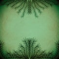 Green branches forming a frame on an old paper texture