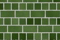 Green brick wall