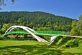 Green bridge for bikers and pedestrians over Dunajec river in Kroscienko, Poland. Royalty Free Stock Photo