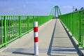 Green bridge  for bikers and pedestrians over Poprad river, Stary Sacz, Poland Royalty Free Stock Photo