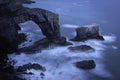 Green Bridge of Wales at twilight. Dramatic Pembrokeshire coastline, South Wales, Uk Royalty Free Stock Photo
