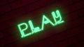 Green bright neon text `PLAY` on a dark brick wall. 3d rendering.