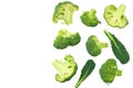 Green Broccoli With Slices And Leaves Isolated On White Background. Top View