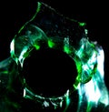 Green broken glass isolated on black background Royalty Free Stock Photo