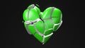 Green broken heart objects in black background. Heart shape object shattered into pieces. Royalty Free Stock Photo