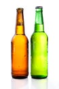 Green and brown beer bottle with drops Royalty Free Stock Photo