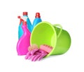 Green bucket, cleaning supplies and tools on white background Royalty Free Stock Photo