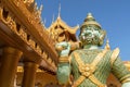 Green buddhist demon guardian statue, Kyauktawgyi pagoda at the foot of Mandalay hill, Myanmar