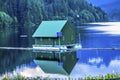 Green Building Capilano Reservoir Lake Reflection Vancouver Brit Royalty Free Stock Photo