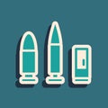 Green Bullet and cartridge icon isolated on green background. Long shadow style. Vector