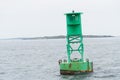 Green Buoy in a shipping lane