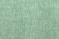 Green burlap with beautiful canvas texture of green fabric in retro style with beautiful green fabric canvas texture as green vint