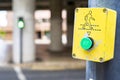 green button to activate light signal to give way to pedestrians Royalty Free Stock Photo