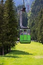 Green cable car cabin