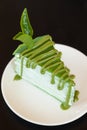 Cake matcha in dish.