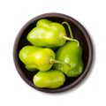 Green cambuci pepper, brazilian cuisine ingredient, on a bowl isolated over white background