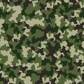 Green camouflage seamless pattern. Military fashion, fabric design. Vector illustration background. Royalty Free Stock Photo