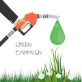 Green campaign concept.Fuel pump in hand man and