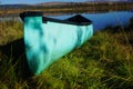 Green Canoe on the shore Royalty Free Stock Photo