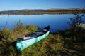 Green Canoe on the shore Royalty Free Stock Photo